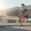 Man stretching outdoors after hormone therapy for men Ellicott MD