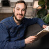 Smiling man feeling renewed confidence after experiencing the benefits of testosterone therapy in Ellicott City MD